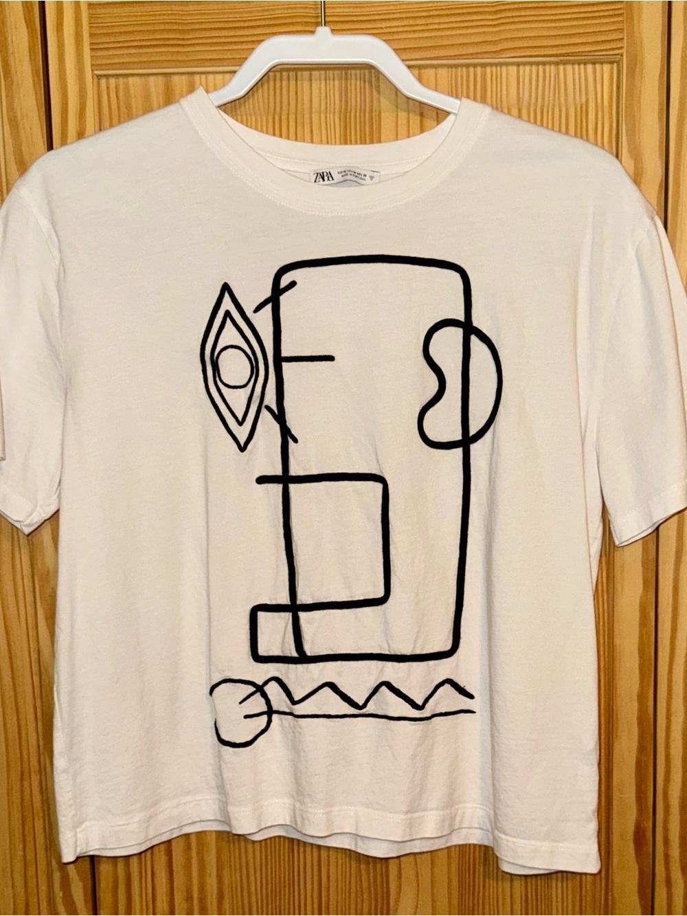 Zara Women’s White Crop Tee with Black Abstract piping/embroidery face, Sz M